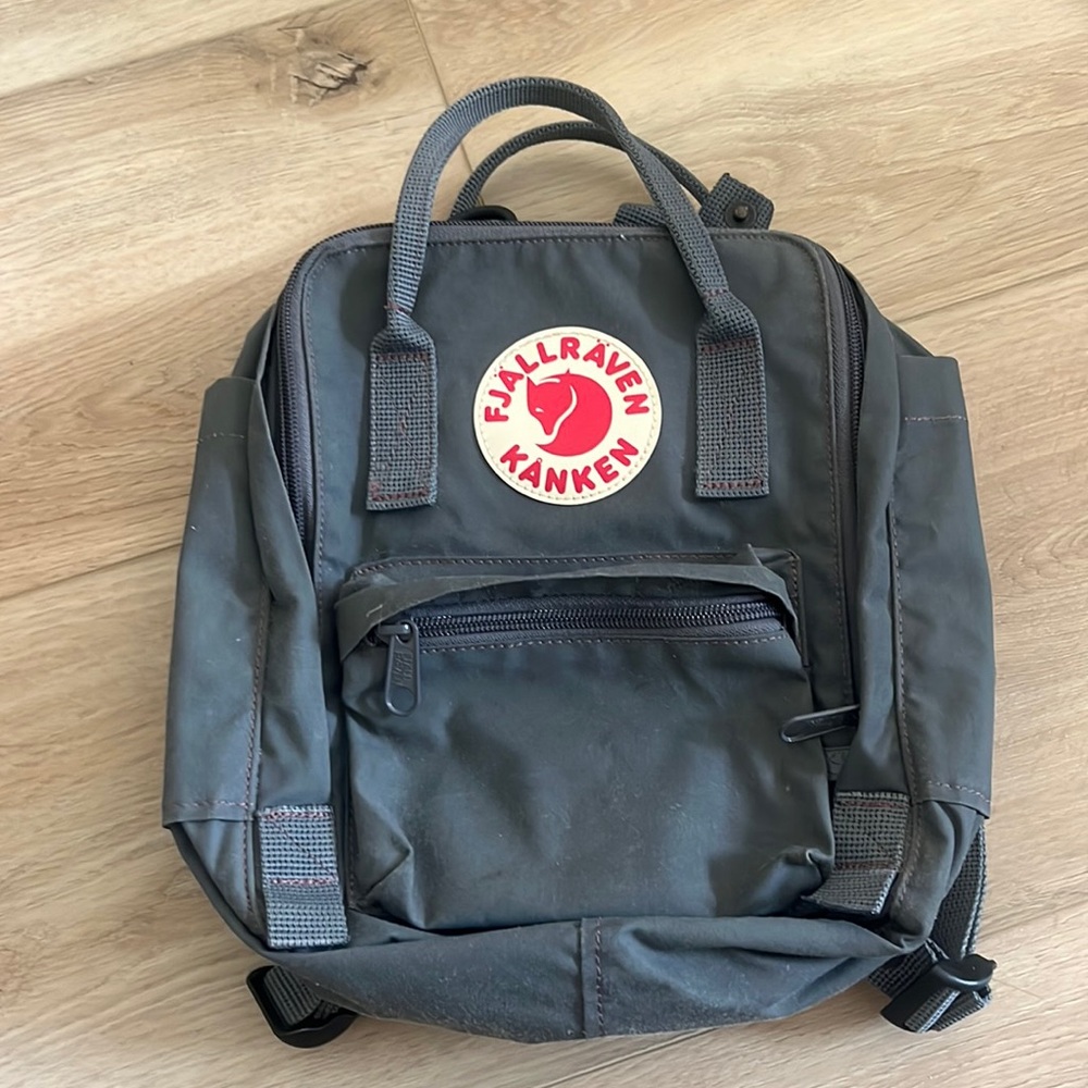 a Fjallraven Kanken mini bag. never used. grey-blue. in prime condition